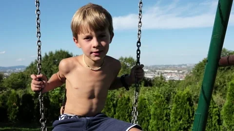 Child on a swing Stock Footage 139402965