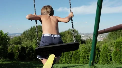 Child on a swing Stock Footage 139402966