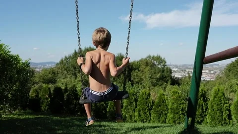 Child on a swing Stock Footage 139402970