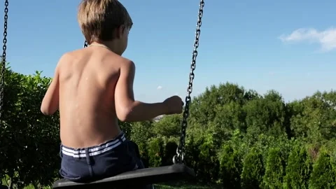 Child on a swing Stock Footage 139402992