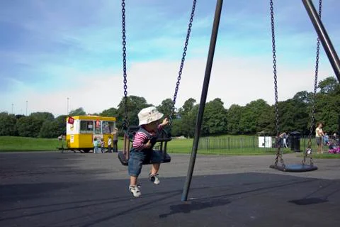 Child on swing. Stock Photos
