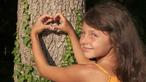 Child symbolizing heart by bark. Stock Footage 231924991
