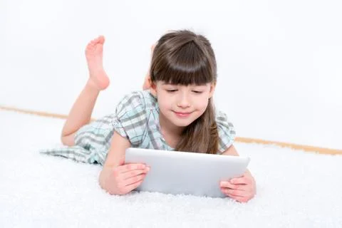 Child with tablet computer Stock Photos
