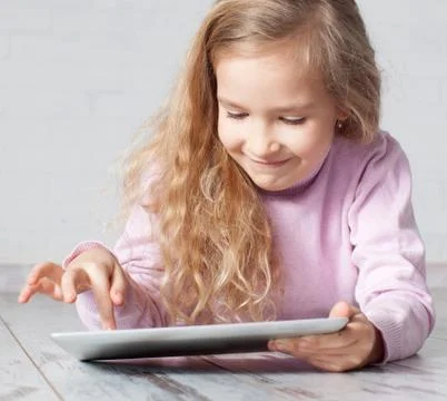 Child with tablet pc Stock Photos