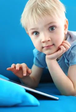 Child with tablet Stock Photos