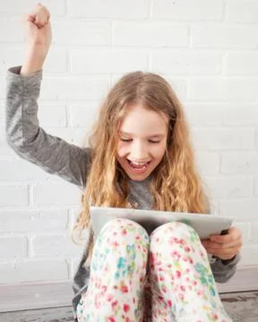 Child with tablet Stock Photos