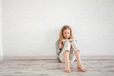 Child with tablet Stock Photos