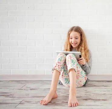 Child with tablet Stock Photos
