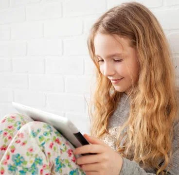 Child with tablet Stock Photos