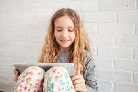 Child with tablet Stock Photos