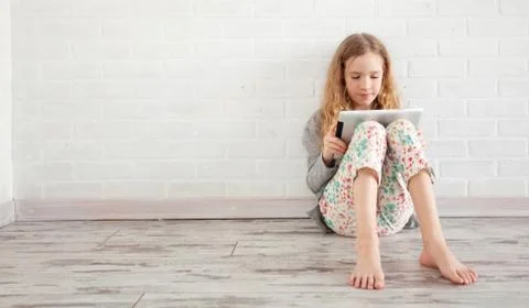 Child with tablet Stock Photos