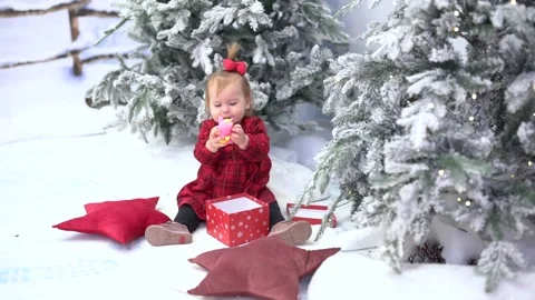 Child takes a toy from the box Stock Footage 224936732