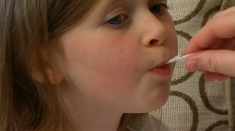 Child taking medicine Stock Footage 22664166