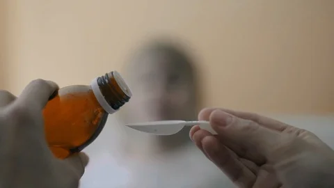 Child taking medicine Stock-Footage 105626059