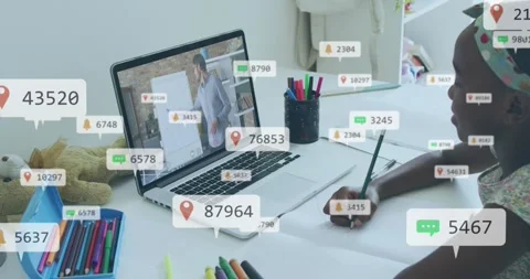 Child taking notes in remote class while chat badges spreading, obscuring then Stockbeeldmateriaal 331833043