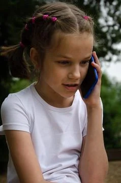 Child talking on the phone Stock Photos