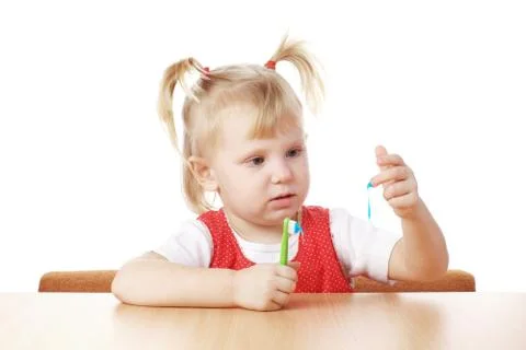 Child with a teeth brush Stock Photos