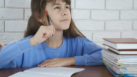The child thinks about homework. Stock Footage 106031095