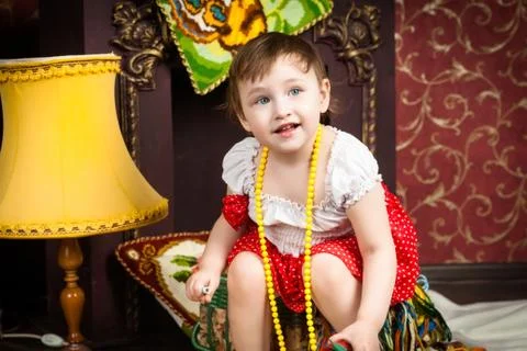 Child, threads, fireplace, lamp, close-up Stock Photos