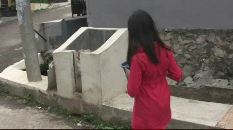 A Child Throwing Out Trash Stock Footage 734995