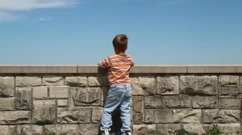 Child throwing stones Video stock 10911504