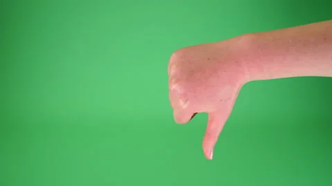 Child thumbs up and thumbs down on Green screen Chromakey pt 2 of 3 Stock Footage 194782095