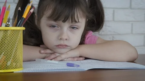 The child is tired of learning. Stock Footage 103273474