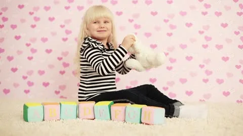 Child torturing a teddy bea Stock Footage 8986283