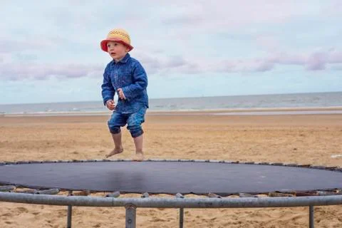 Child on a trampoline Stock Photos