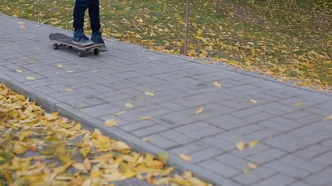 Child try to skate Stock Footage 83270460