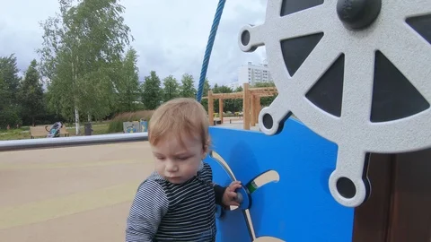 Child turns the steering wheel Stock Footage 112183054