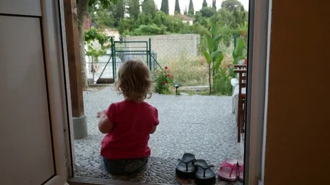 Child two years old playing on smartphone. Video stock 78864737