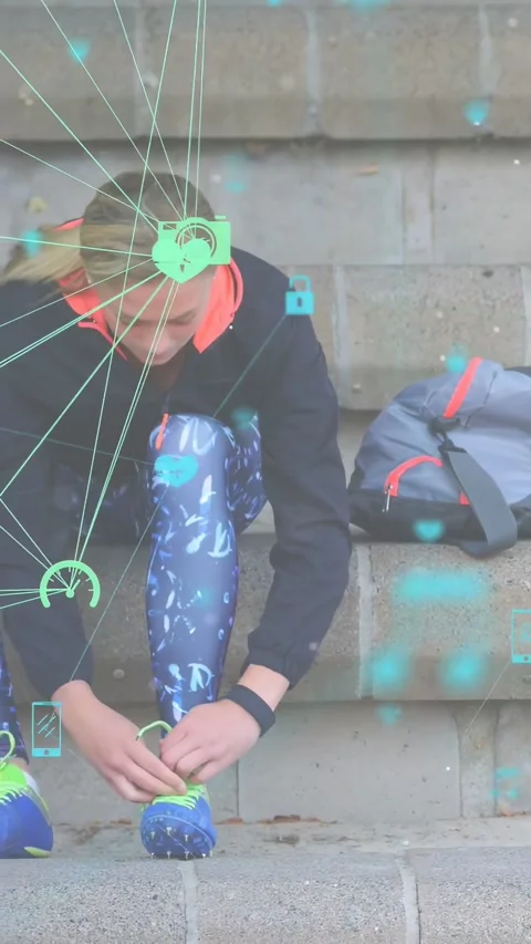 Child tying shoelaces on steps preparing for sports run, network graphics 스톡 동영상 332507168
