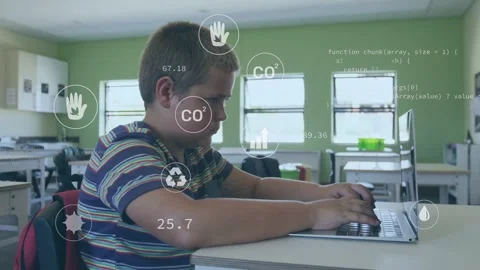 Child typing on laptop in classroom, animating environment icons and data Stock Footage 332577405