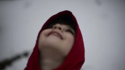 Child under a snowfall snowflake Stock Footage 86828140