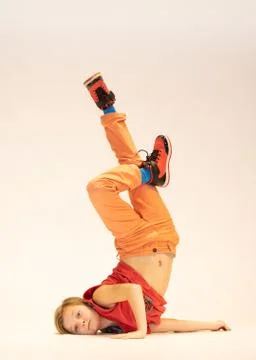 Child in a unique dance pose Stock Photos