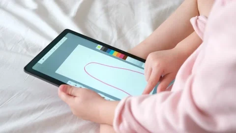 Child Use tablet for drawing  Stock Footage 201246847