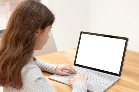 Child Uses a Computer for School Work Photos