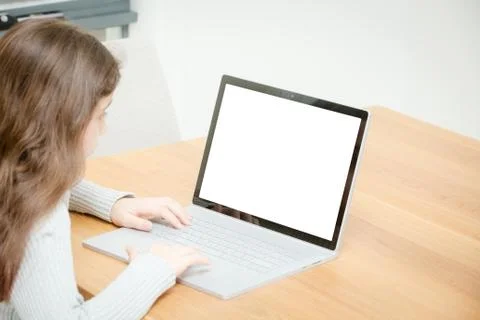 Child Uses a Computer for School Work Foto stock