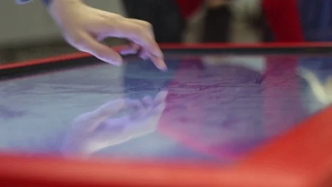 Child uses a large touch screen Stock Footage 81787221