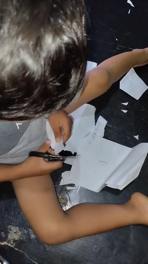 Child uses scissors Stock Footage 290856926