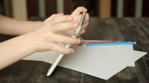 Child uses a tablet Stock Footage 61912301