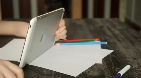 Child uses a tablet PC Stock Footage 61907201