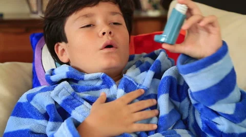 Child using asthma inhaler 2 Video stock 56733189