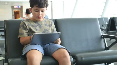 Child  using ipad Stock Footage 53129377
