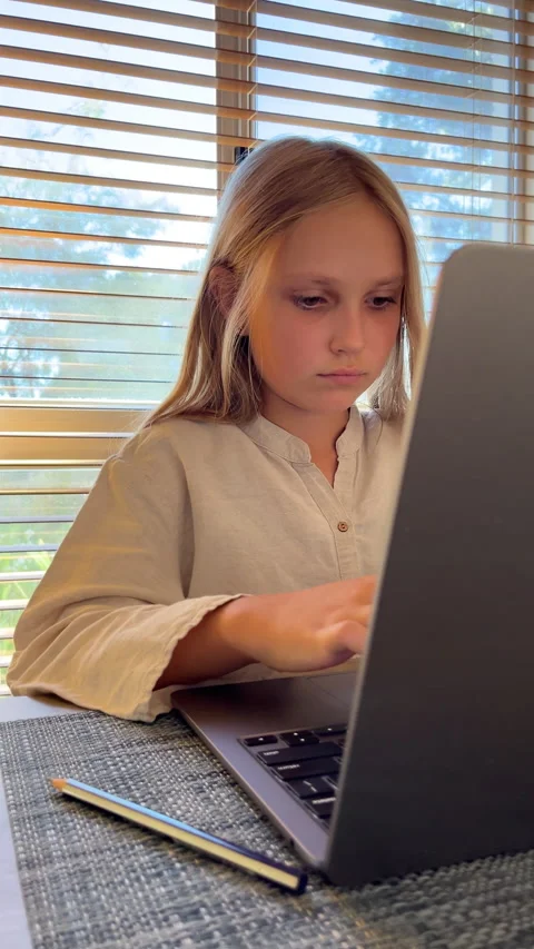 Child using laptop at home, vertical shots Stock Footage 302061443