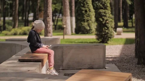 Child is using mobile phone. Kid is looking at screen of devices. Stock-Footage 131772509