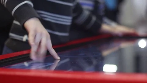 Child is using more playing touch table Stock Footage 81787105
