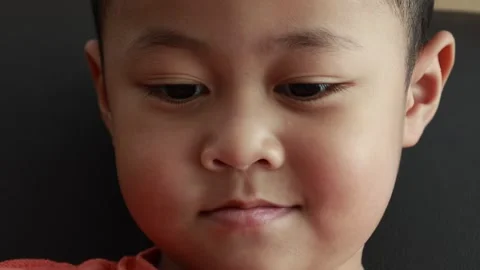 Child using phone on sofa at home Stock-Footage 333888857
