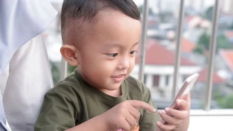 Child Using Smartphone, Kid Playing On Smart Phone, Boy Outdoor In Park 스톡 동영상 156671553